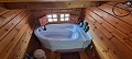 Villa de 4 dormitorios y 2 baños y casa de madera de 4 dormitorios y 2 baños en venta en La Romana. in Spanish Fincas