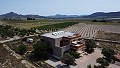 Schitterende, 70% afgewerkte nieuwbouwvilla met 7 slaapkamers en 4 badkamers te koop in Salinas. in Spanish Fincas