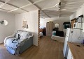 Casa de campo de 3 dormitorios con un apartamento anexo de 2 dormitorios más un estudio de 1 dormitorio en Sax. in Spanish Fincas