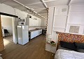 Casa de campo de 3 dormitorios con un apartamento anexo de 2 dormitorios más un estudio de 1 dormitorio en Sax. in Spanish Fincas