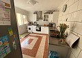 Casa de campo de 3 dormitorios con un apartamento anexo de 2 dormitorios más un estudio de 1 dormitorio en Sax. in Spanish Fincas