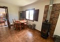 Casa de campo de 3 dormitorios con un apartamento anexo de 2 dormitorios más un estudio de 1 dormitorio en Sax. in Spanish Fincas
