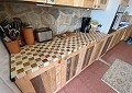 Casa de campo de 3 dormitorios con un apartamento anexo de 2 dormitorios más un estudio de 1 dormitorio en Sax. in Spanish Fincas