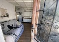 Casa de campo de 3 dormitorios con un apartamento anexo de 2 dormitorios más un estudio de 1 dormitorio en Sax. in Spanish Fincas