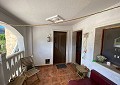 Casa de campo de 3 dormitorios con un apartamento anexo de 2 dormitorios más un estudio de 1 dormitorio en Sax. in Spanish Fincas