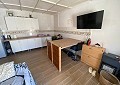 Casa de campo de 3 dormitorios con un apartamento anexo de 2 dormitorios más un estudio de 1 dormitorio en Sax. in Spanish Fincas