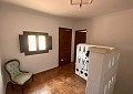 Casa de campo de 3 dormitorios con un apartamento anexo de 2 dormitorios más un estudio de 1 dormitorio en Sax. in Spanish Fincas