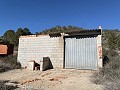 Gran parcela con construcción incompleta in Spanish Fincas