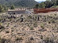 Gran parcela con construcción incompleta in Spanish Fincas