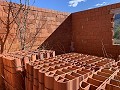 Gran parcela con construcción incompleta in Spanish Fincas