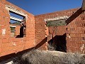 Gran parcela con construcción incompleta in Spanish Fincas