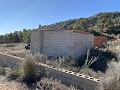 Gran parcela con construcción incompleta in Spanish Fincas