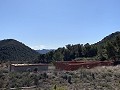 Gran parcela con construcción incompleta in Spanish Fincas