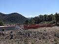 Gran parcela con construcción incompleta in Spanish Fincas