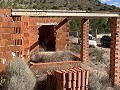 Gran parcela con construcción incompleta in Spanish Fincas