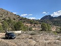 Gran parcela con construcción incompleta in Spanish Fincas