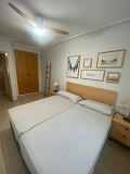 Moderno apartamento de 2 dormitorios con vistas despejadas – Ubicación privilegiada en Benidorm in Spanish Fincas