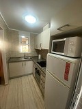 Moderno apartamento de 2 dormitorios con vistas despejadas – Ubicación privilegiada en Benidorm in Spanish Fincas