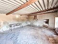 Grote kans in El Xinorlet: huis om te renoveren met grot en terrein in Spanish Fincas