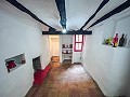 2 Townhouses with Ample Possibilities in Onil in Spanish Fincas