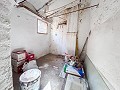 2 Townhouses with Ample Possibilities in Onil in Spanish Fincas