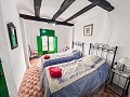 2 Townhouses with Ample Possibilities in Onil in Spanish Fincas