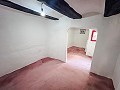 2 Townhouses with Ample Possibilities in Onil in Spanish Fincas
