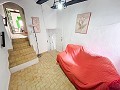 2 Townhouses with Ample Possibilities in Onil in Spanish Fincas