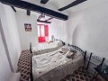 2 Townhouses with Ample Possibilities in Onil in Spanish Fincas