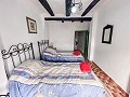 2 Townhouses with Ample Possibilities in Onil in Spanish Fincas
