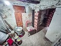 2 Townhouses with Ample Possibilities in Onil in Spanish Fincas