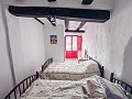 2 Townhouses with Ample Possibilities in Onil in Spanish Fincas