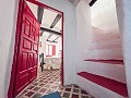 2 Townhouses with Ample Possibilities in Onil in Spanish Fincas